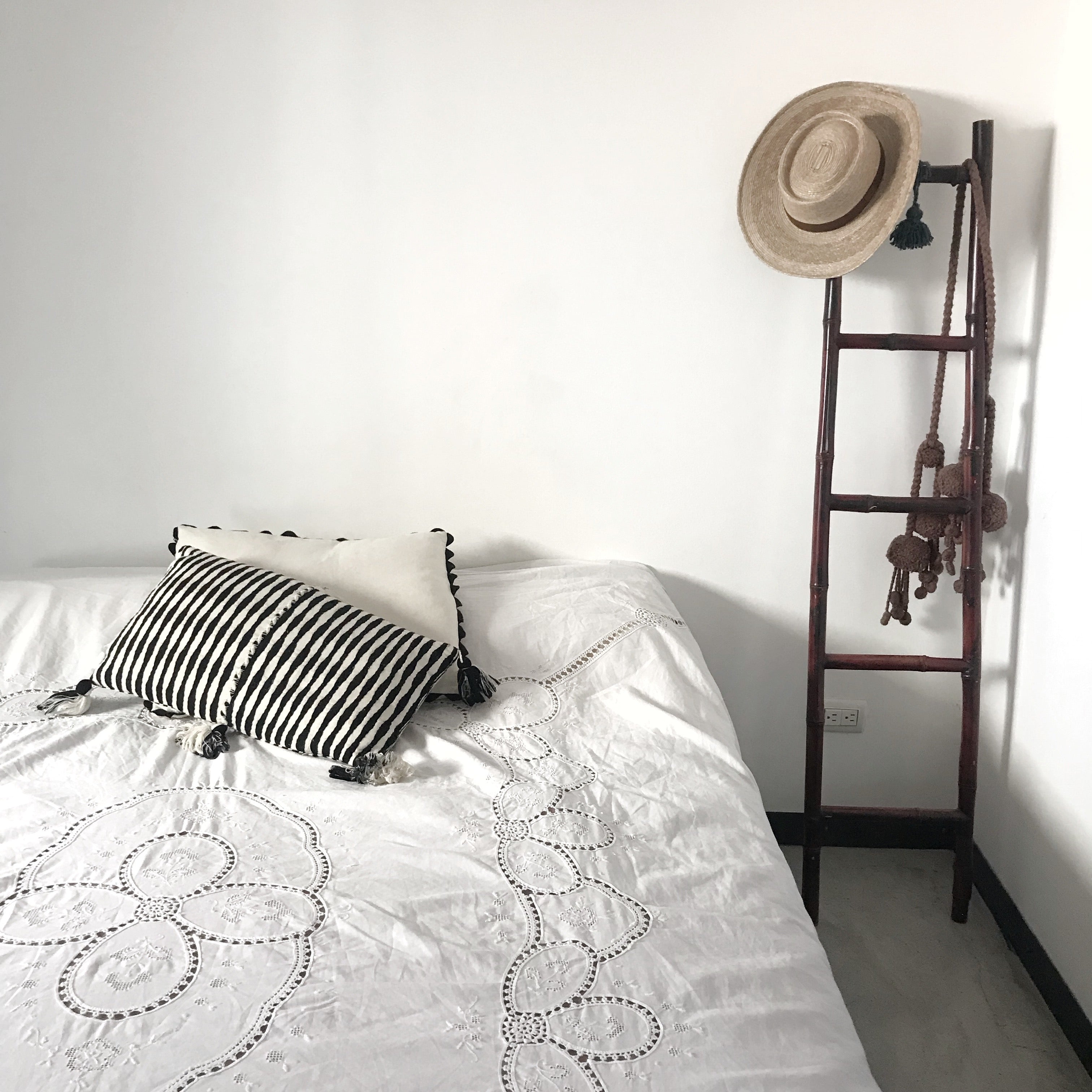 Antigua Pillow in Black and Natural Ivory